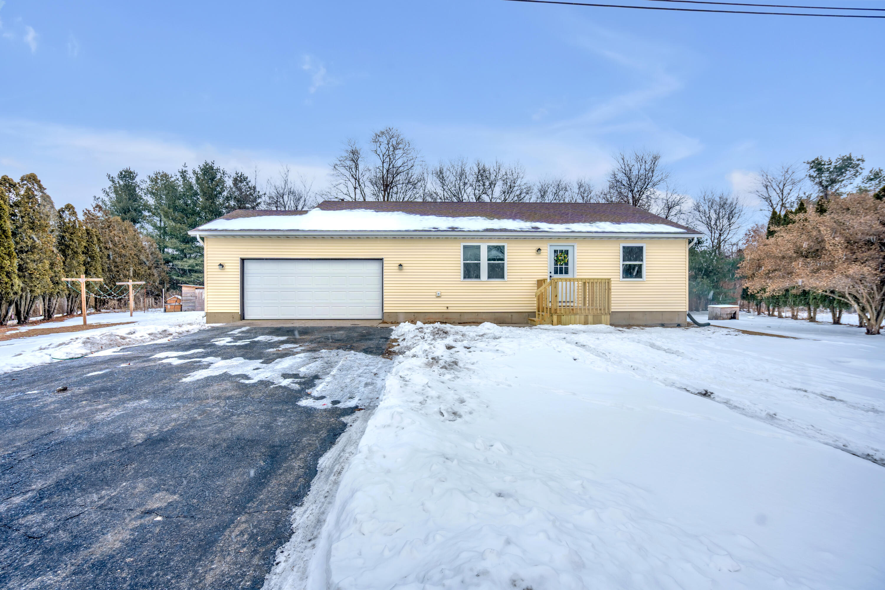 3902 North Explorer Lane Wheatfield, IN 46392 - Photo 2 of 34 front view of a house with a yard