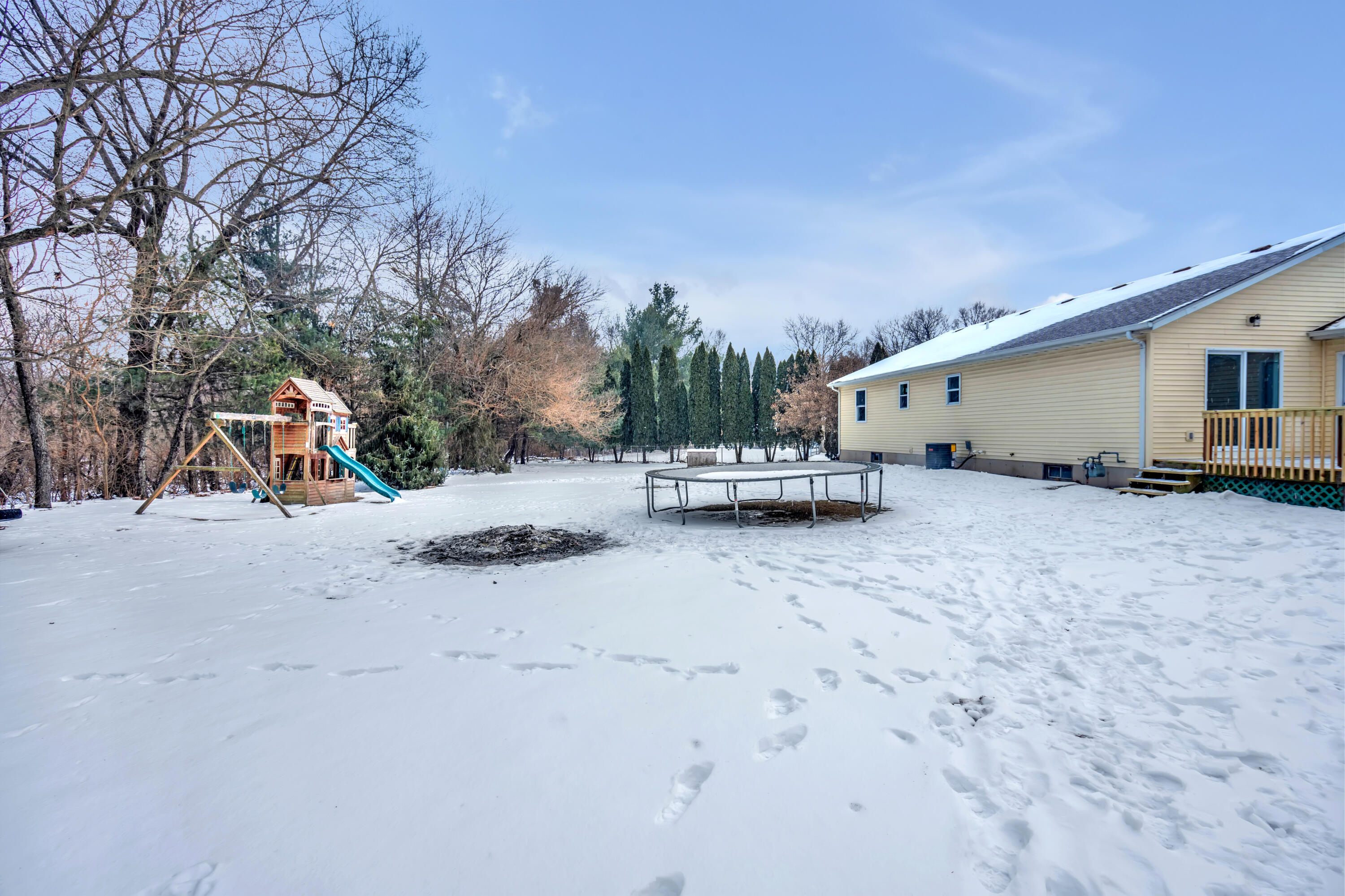 3902 North Explorer Lane Wheatfield, IN 46392 - Photo 29 of 34 a view of the back yard of the house