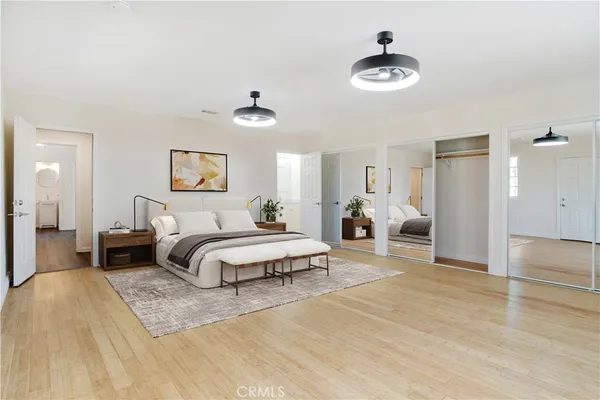 a view of a livingroom with a chandelier fan