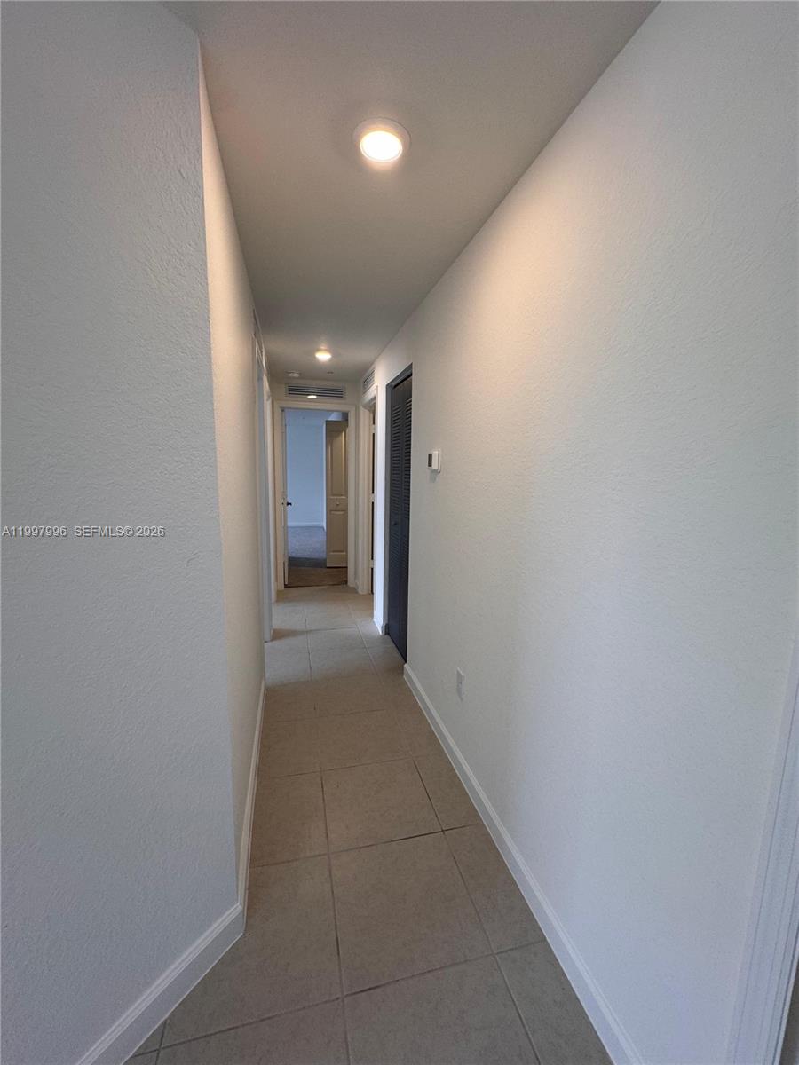 15615 Southwest 280th Street, Unit 10 Homestead, FL 33032 - Photo 11 of 23 a view of hallway