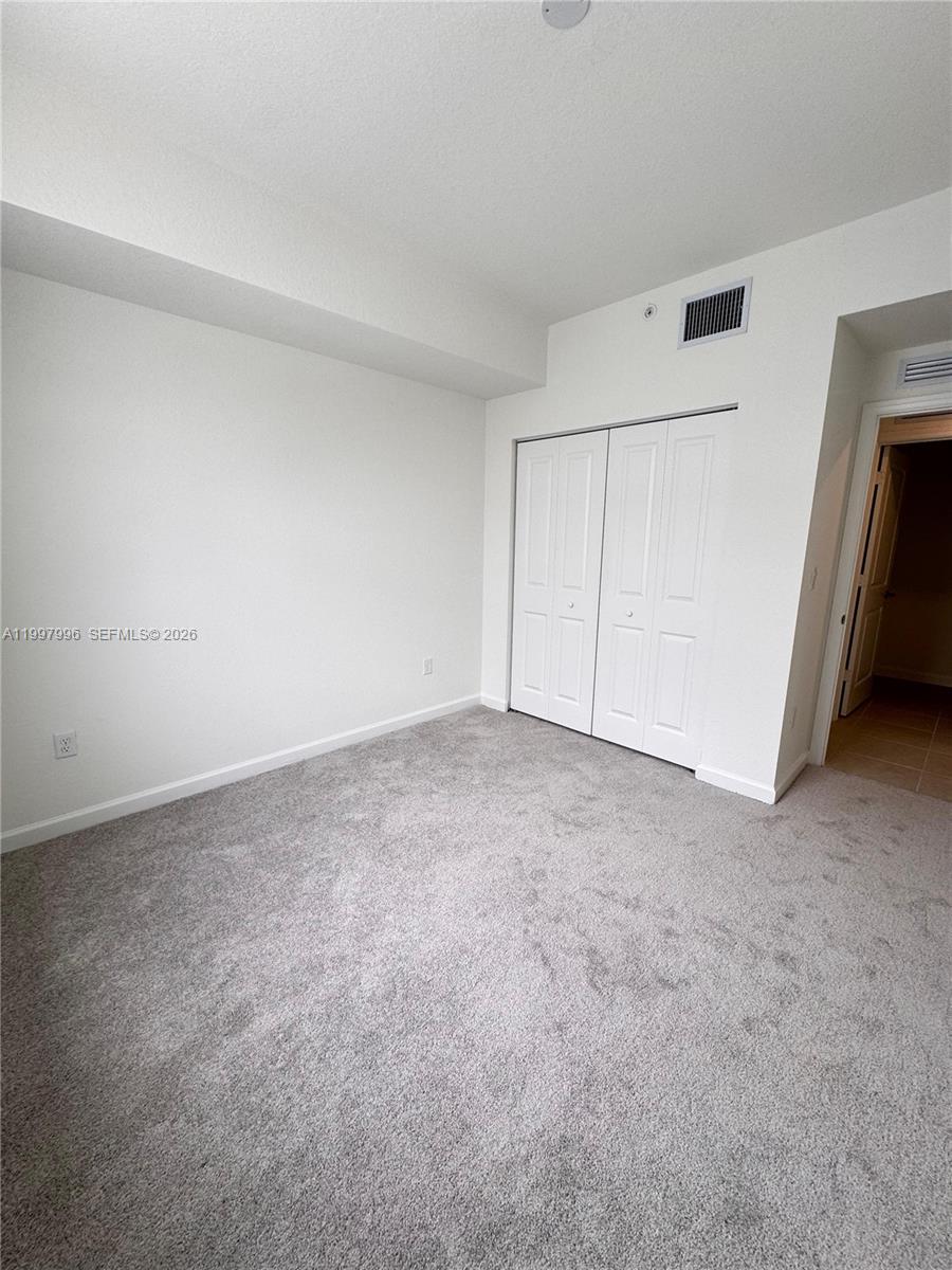15615 Southwest 280th Street, Unit 10 Homestead, FL 33032 - Photo 20 of 23 a view of an empty room