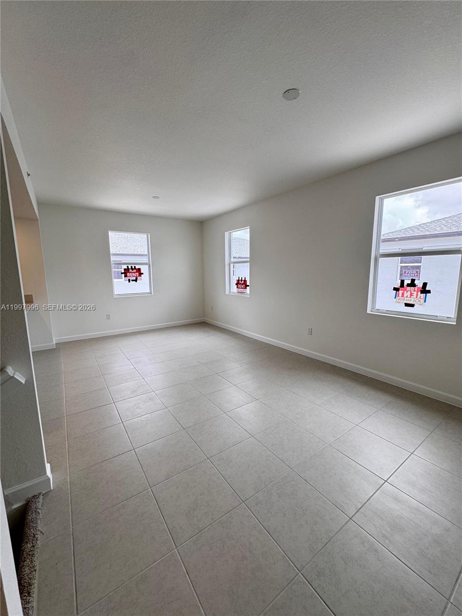 15615 Southwest 280th Street, Unit 10 Homestead, FL 33032 - Photo 10 of 23 a view of an empty room