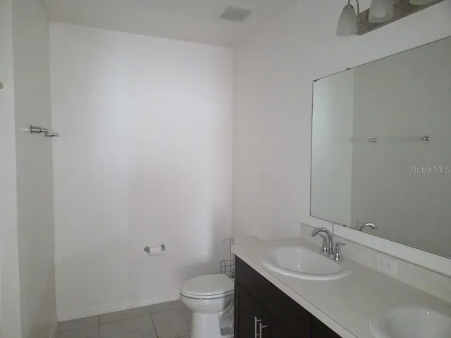 a bathroom with a sink and a toilet