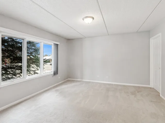 $339,900 | 8650 North Shermer Road, Unit 102, Niles, IL 60714