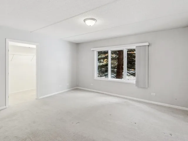 $339,900 | 8650 North Shermer Road, Unit 102, Niles, IL 60714