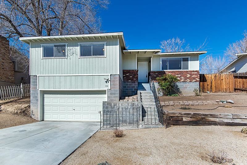 1995 West 6th Street Reno, NV 89503 - Photo 1 of 1 a front view of a house with garage