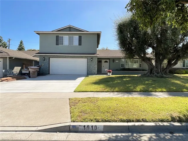 a view of a house with a swimming pool