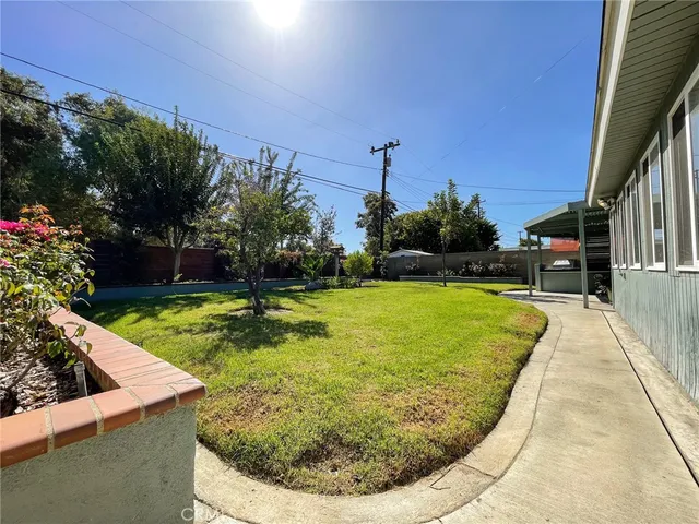 a view of swimming pool with seating space
