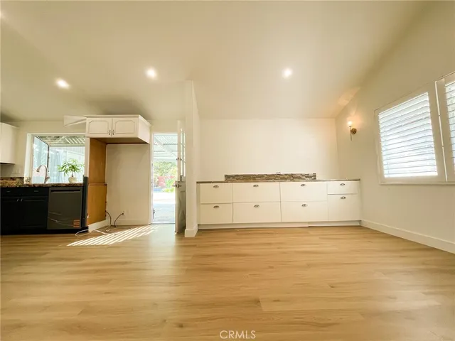 a view of a kitchen with a sink