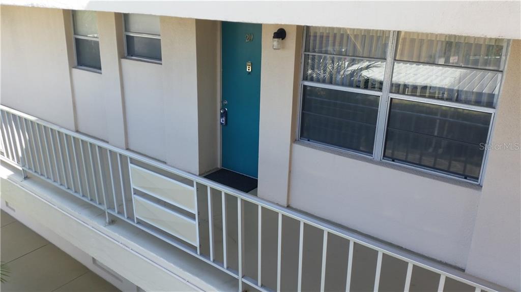 9950 47th Avenue North, Unit 211 St. Petersburg, FL 33708 - Photo 1 of 1 Entrance to unit 207.