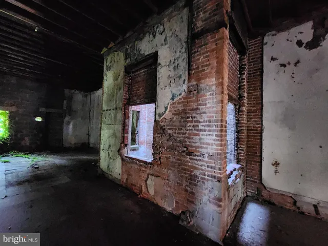 a pathway of water heater on wooden floor