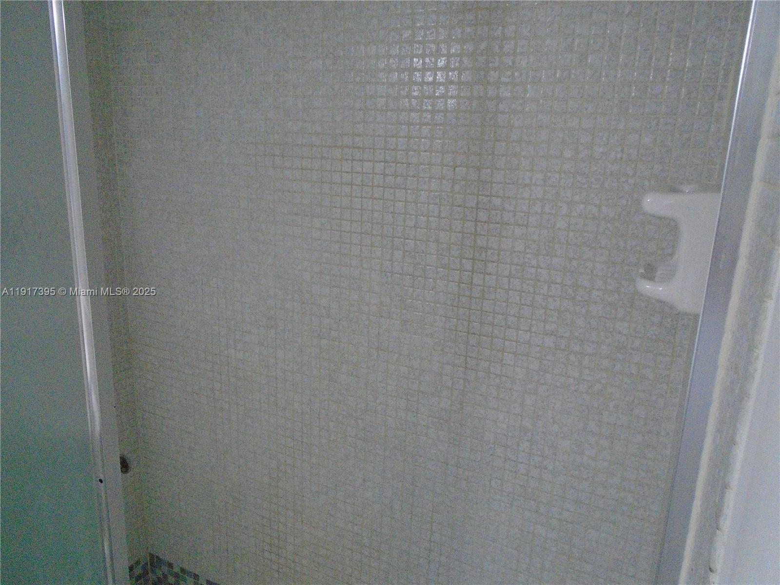 4176 Inverrary Drive, Unit 209 Lauderhill, FL 33319 - Photo 10 of 15 a bathroom with a shower