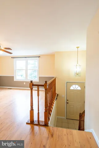 a view of a hallway with an entryway