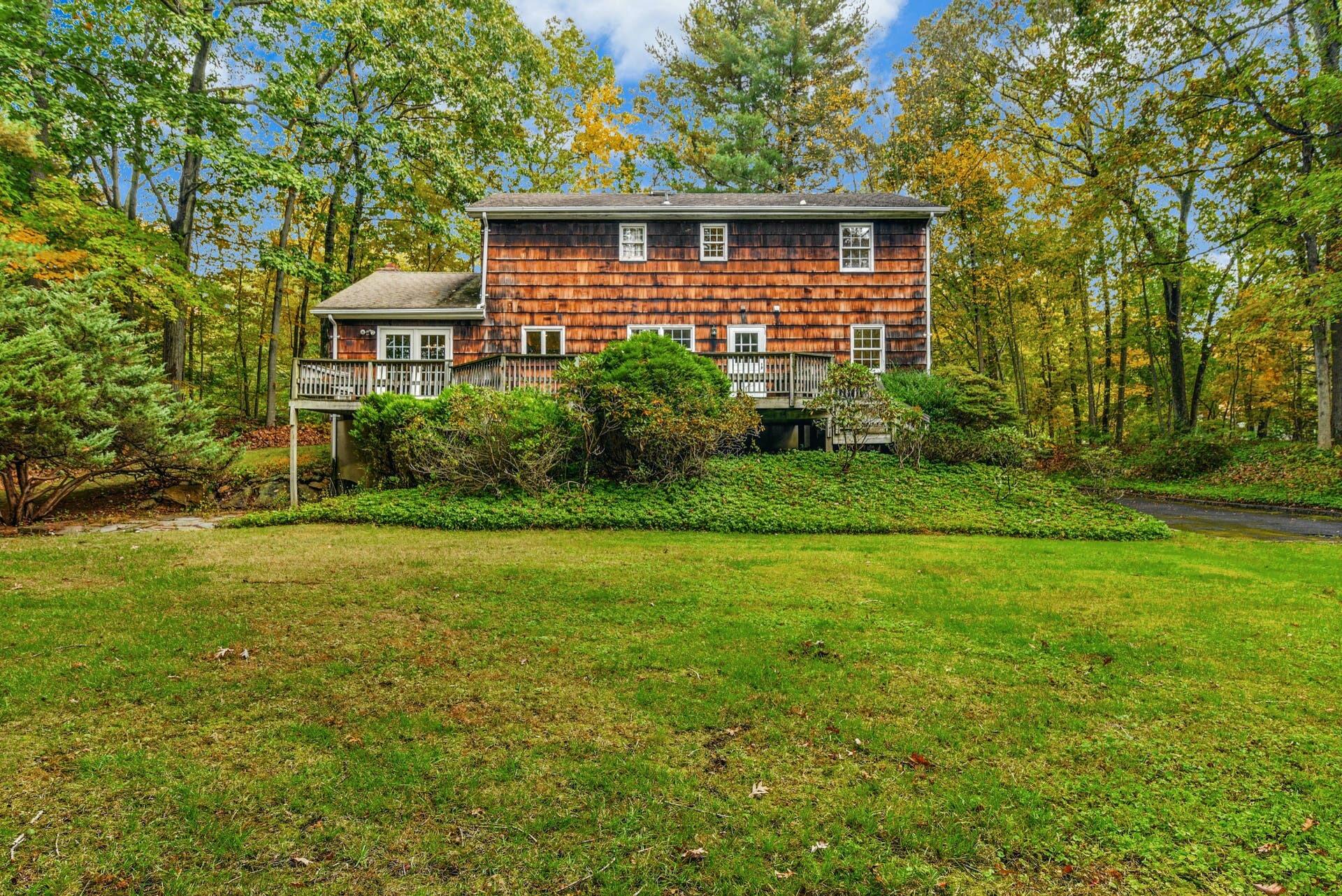 8 Little Brook Road North Darien, CT 06820 - Photo 22 of 23 a view of a house with a yard