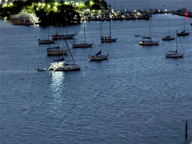 a view of a backyard with sitting area