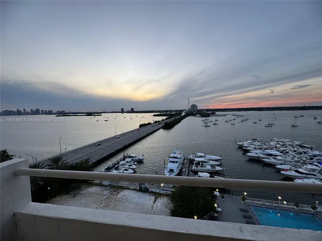 a view of roof with seating area