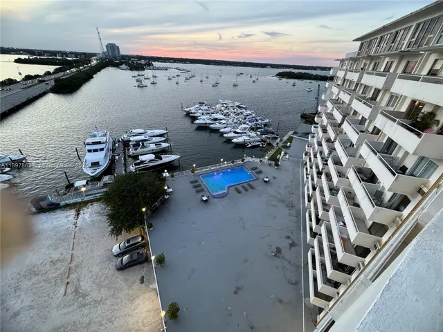 walk in closet with wooden floor