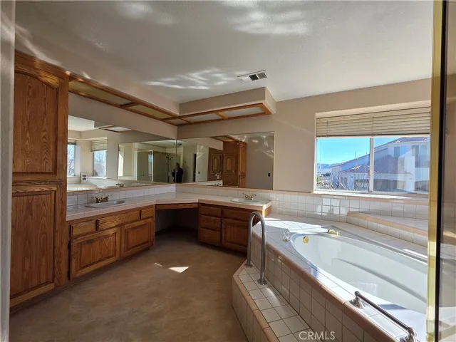 a large kitchen with a large window