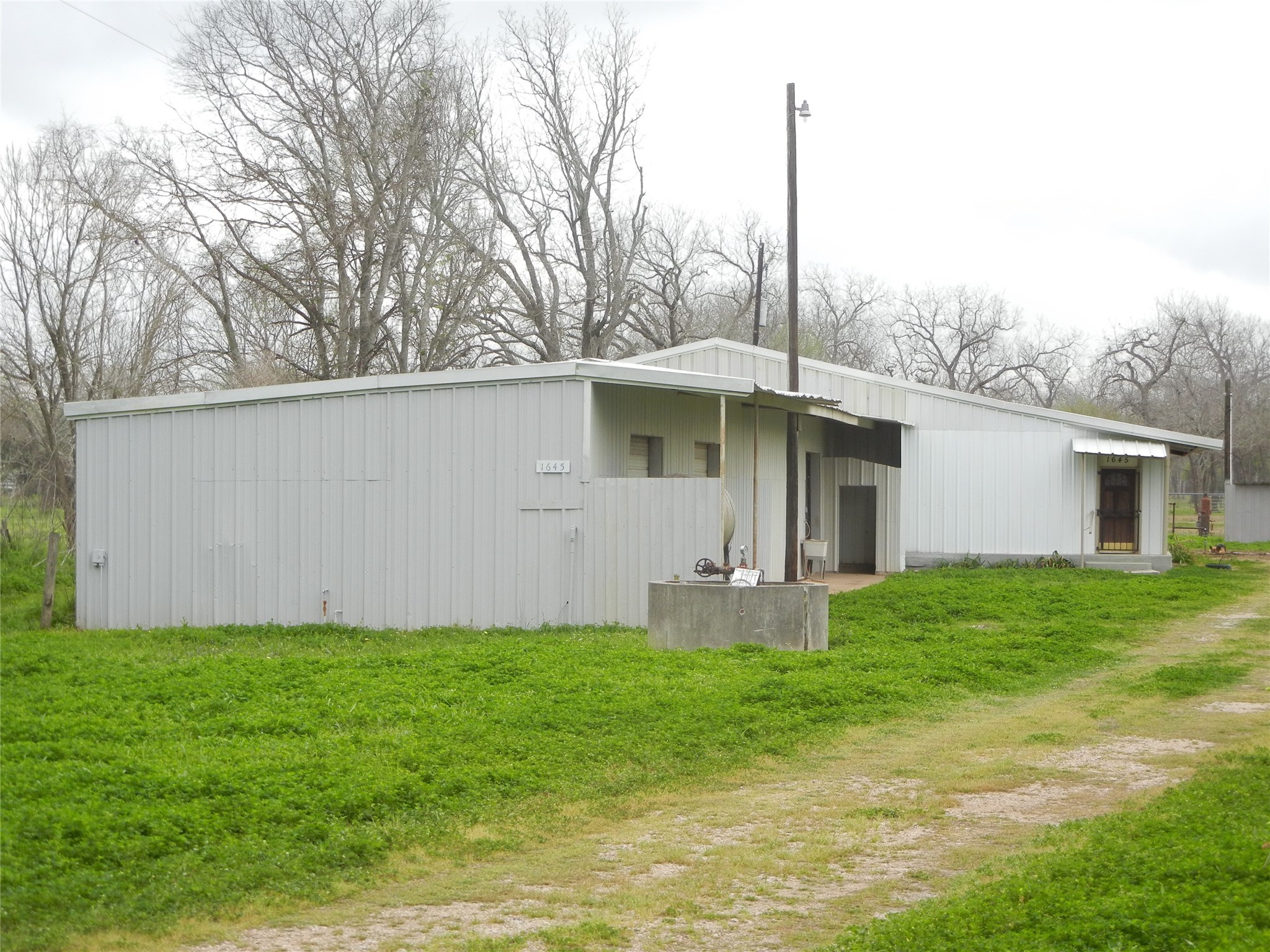 1645 Peach Ridge Road Brookshire, TX 77423 - Photo 20 of 42 view of shop from the road