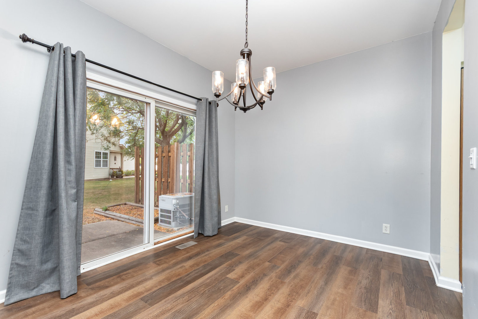 1796 South Wentworth Circle Romeoville, IL 60446 - Photo 7 of 21 a view of a chandelier in a room