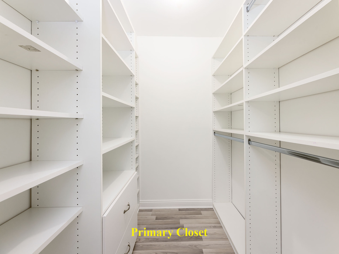 2315 East Olive Street, Unit 2B Arlington Heights, IL 60004 - Photo 20 of 30 a view of walk in closet with empty racks