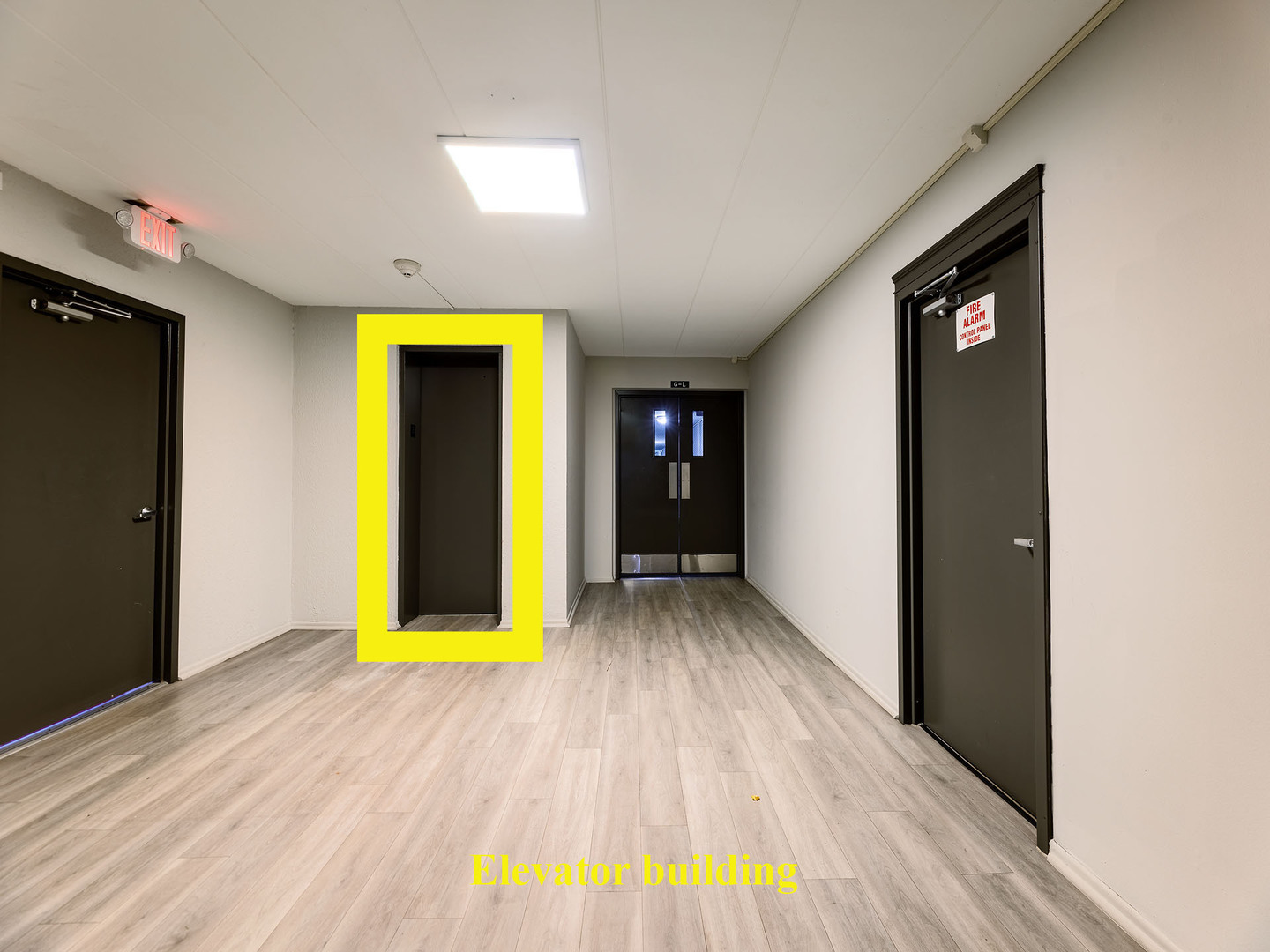 2315 East Olive Street, Unit 2B Arlington Heights, IL 60004 - Photo 22 of 30 a view of an empty room with wooden floor and a window