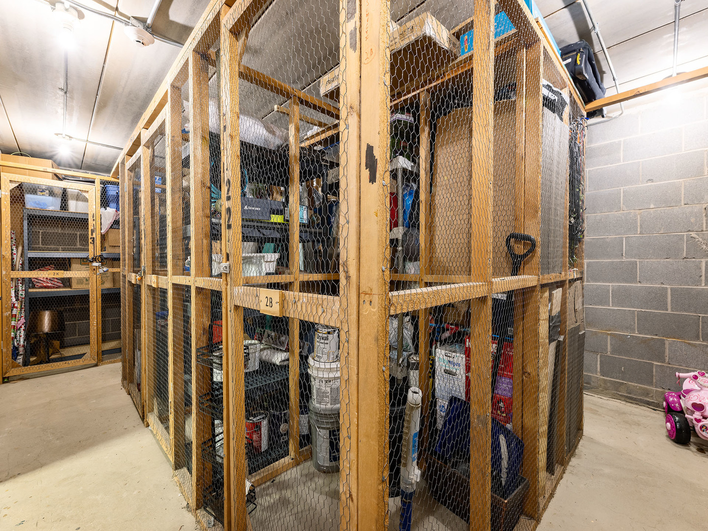 2315 East Olive Street, Unit 2B Arlington Heights, IL 60004 - Photo 24 of 30 a view of walk in closet with clothes and shoes