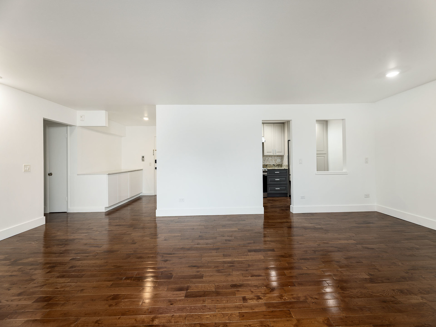 2315 East Olive Street, Unit 2B Arlington Heights, IL 60004 - Photo 10 of 30 a view of empty room with wooden floor