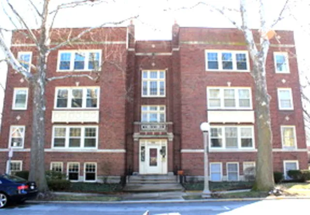 a front view of a brick building