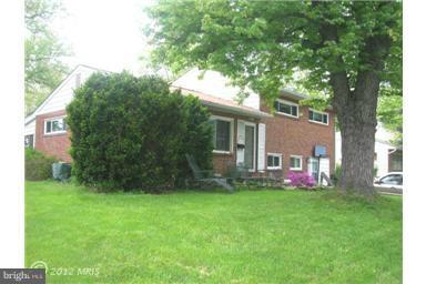5901 Robindale Road Catonsville, MD 21228 - Photo 2 of 15 a front view of house with a garden