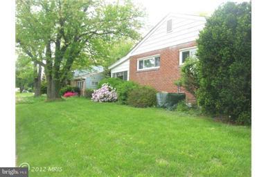 5901 Robindale Road Catonsville, MD 21228 - Photo 13 of 15 a front view of a house with garden