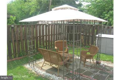 5901 Robindale Road Catonsville, MD 21228 - Photo 14 of 15 a garden view with a swimming pool