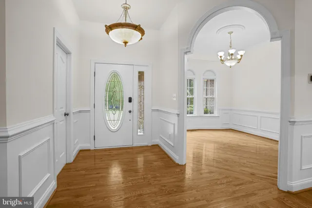 a view of livingroom with hardwood floor and hallway