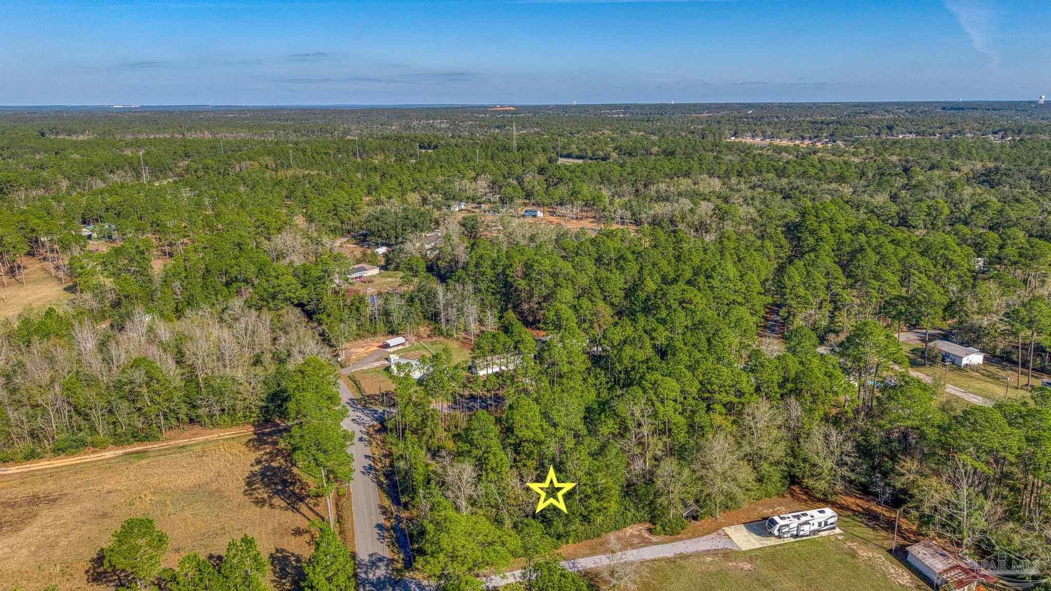 2 Petersen Point Road Milton, FL 32583 - Photo 10 of 15 a view of an outdoor space with a lake view