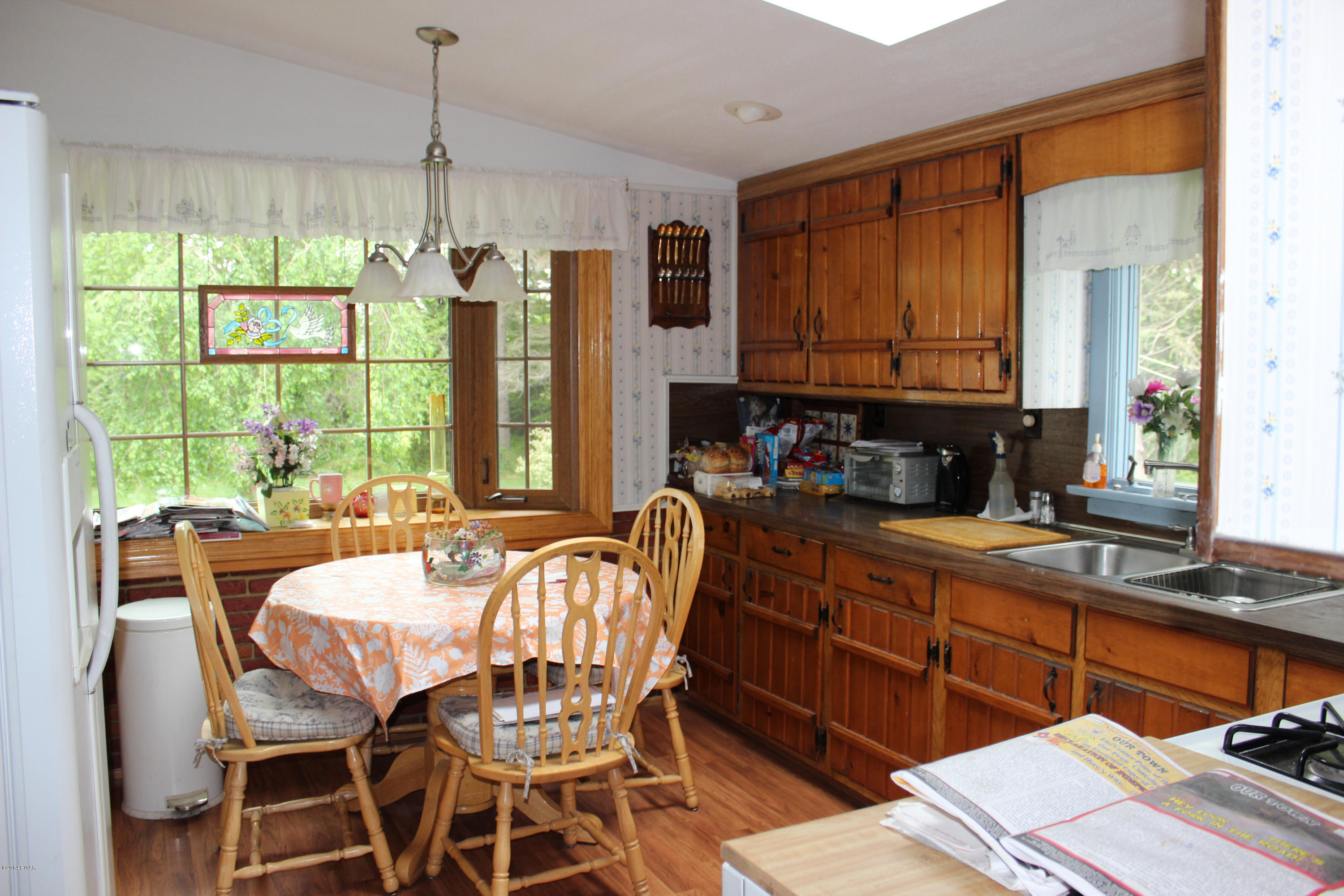 2465 Aberdeen Road Moscow, PA 18444 - Photo 12 of 21 a dining room with a large window and chairs