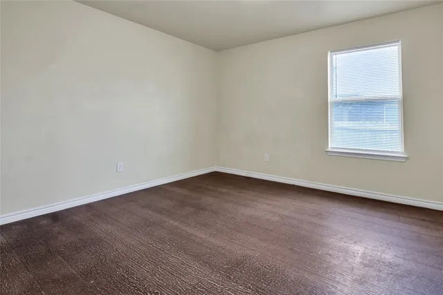 a bathroom with a toilet bathtub and shower