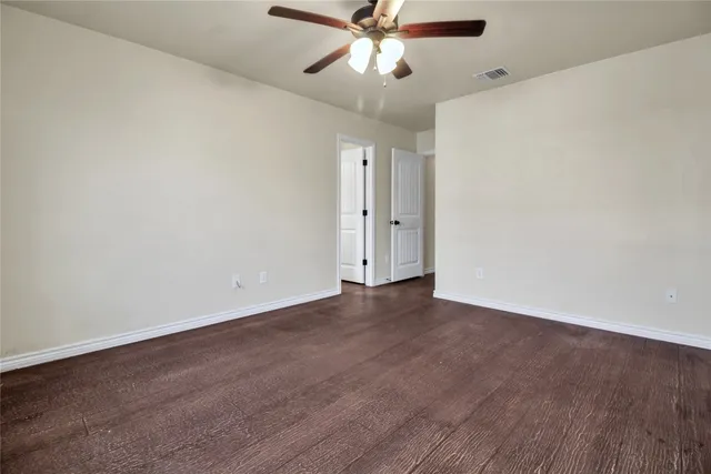 a bathroom with a double vanity sink mirror double and bathtub