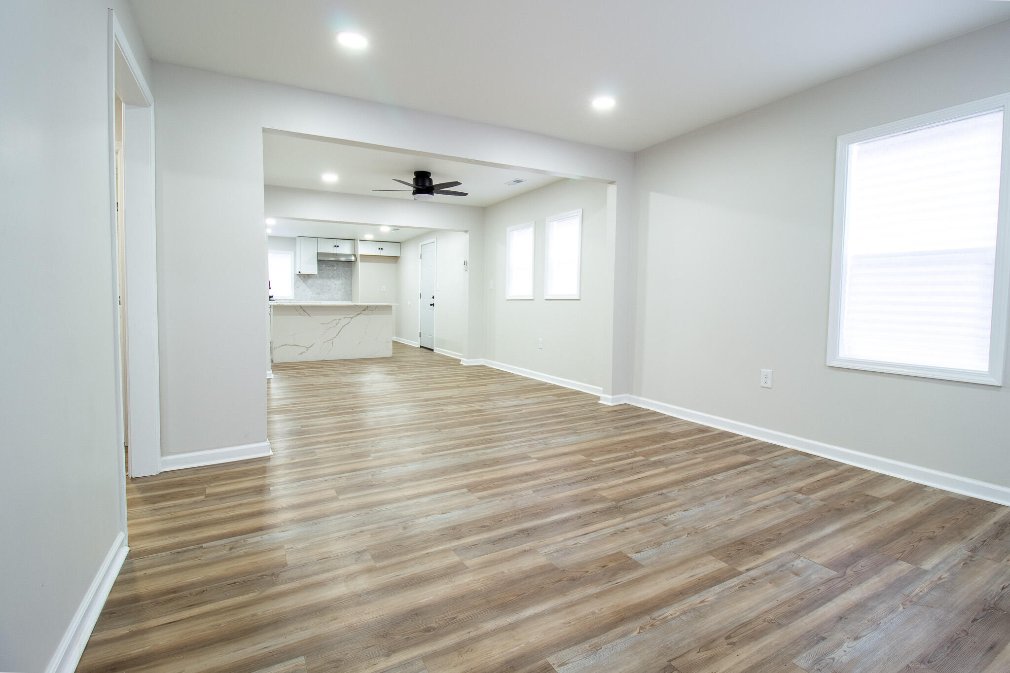 1755 Ralston Street Gary, IN 46406 - Photo 3 of 29 wooden floor in an empty room with a window