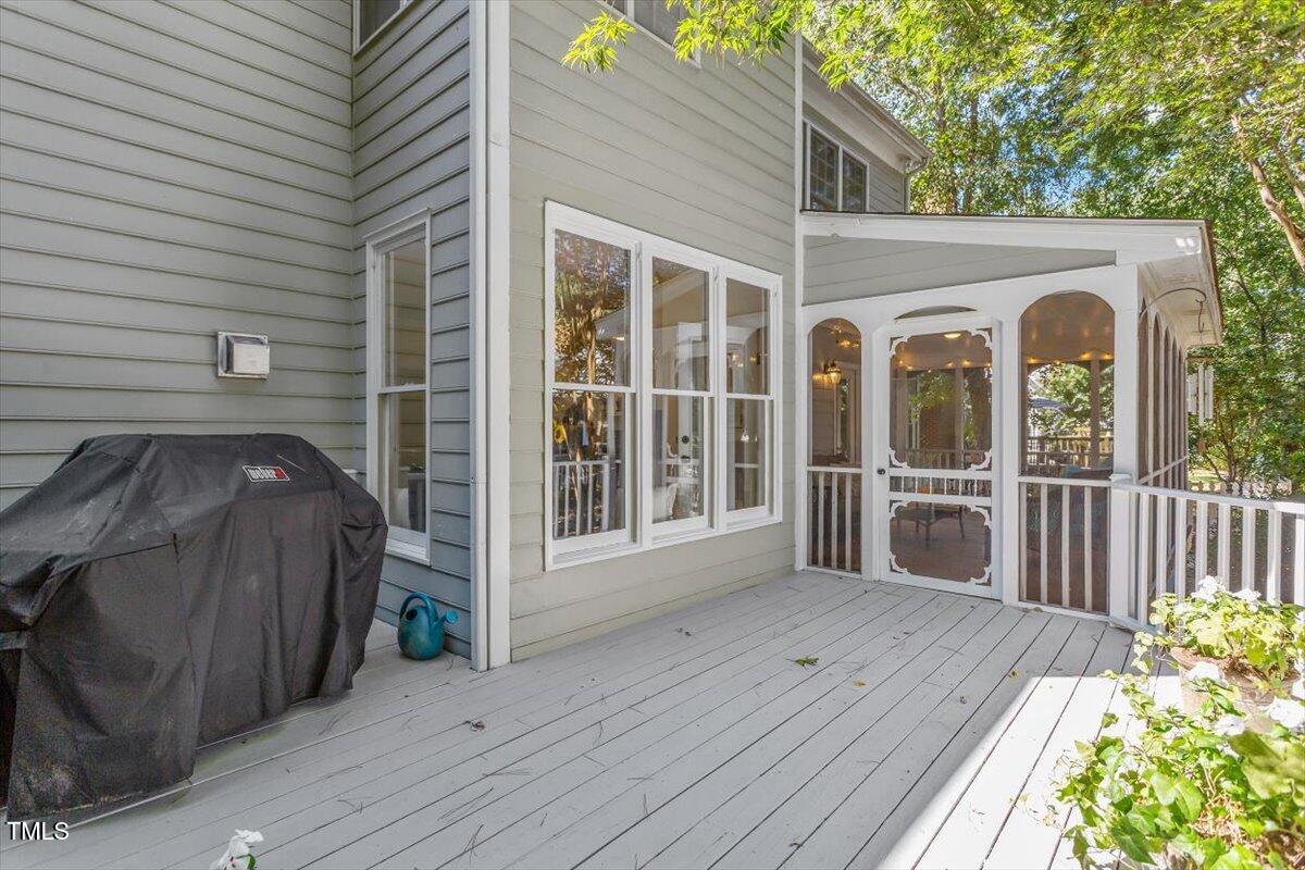 1925 Baronsmede Drive Raleigh, NC 27615 - Photo 33 of 38 Deck off Screen Porch