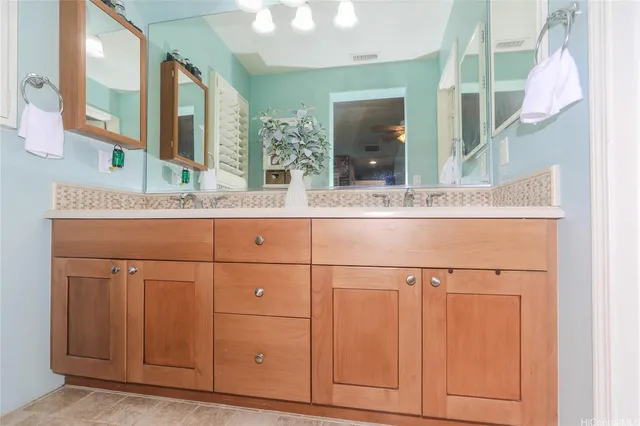 a sink with a mirror