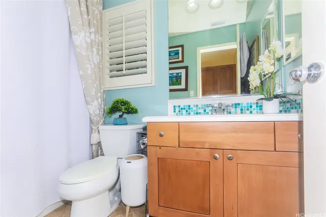a bathroom with a sink and a toilet
