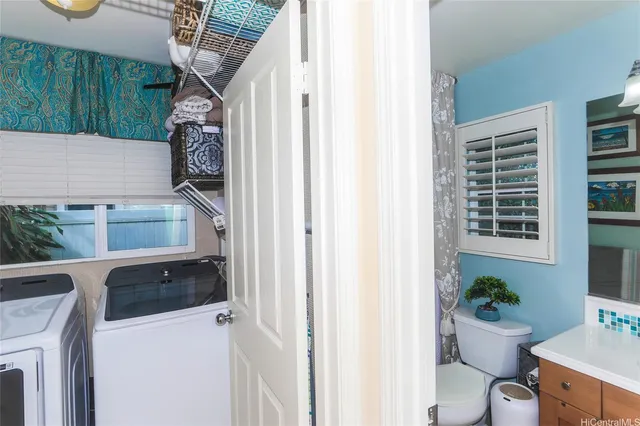 a utility room with dryer and washer