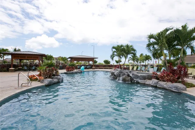 a view of a yard with cars parked