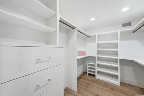 a storage room with wooden floor