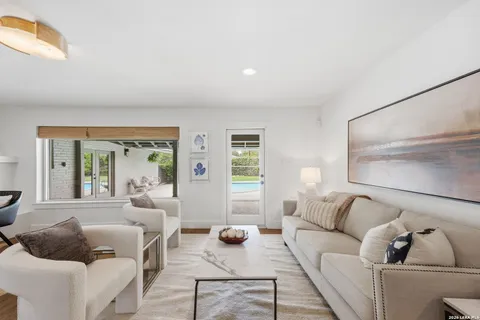 a living room with furniture and a couch