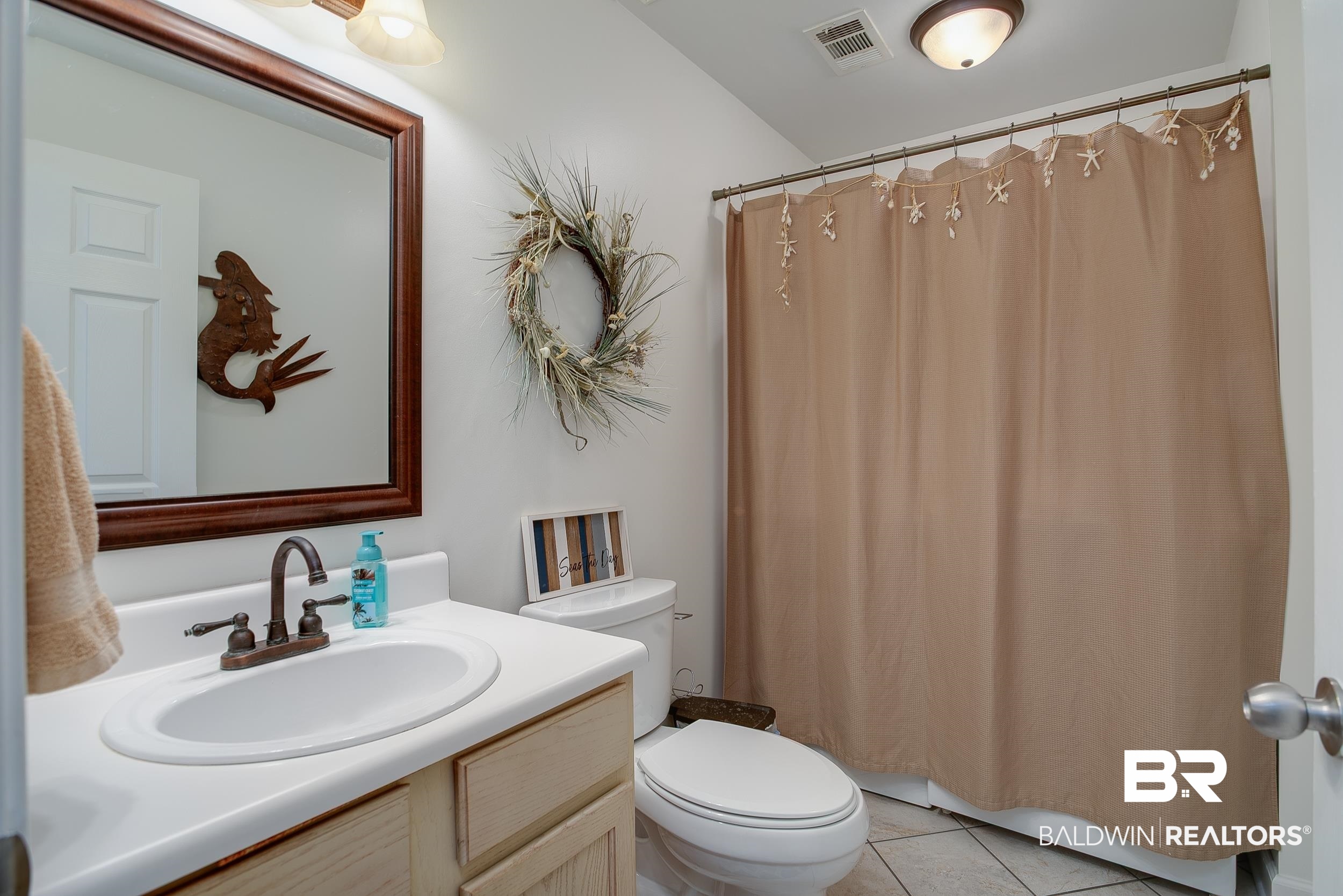 1517 Regency Road, Unit 33 Gulf Shores, AL 36542 - Photo 12 of 29 Half Bath/Laundry