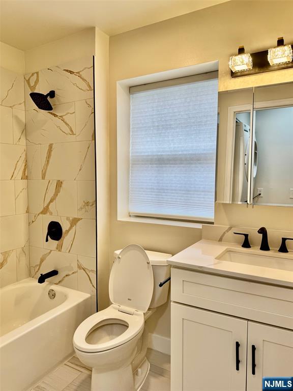 34 Bergen Ridge Road, Unit 2 North Bergen, NJ 07047 - Photo 17 of 41 a bathroom with a sink a toilet and a bathtub