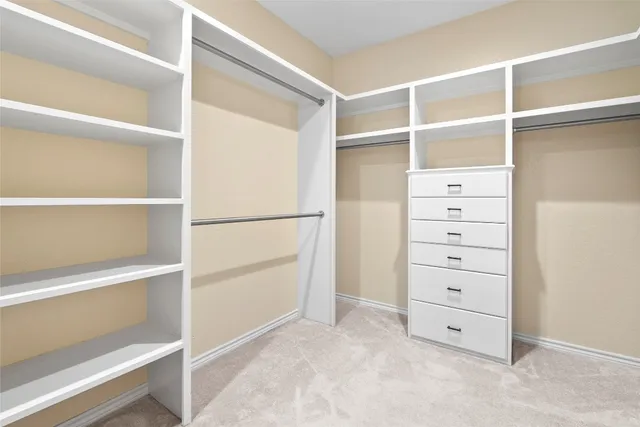 a view of an empty walk in closet
