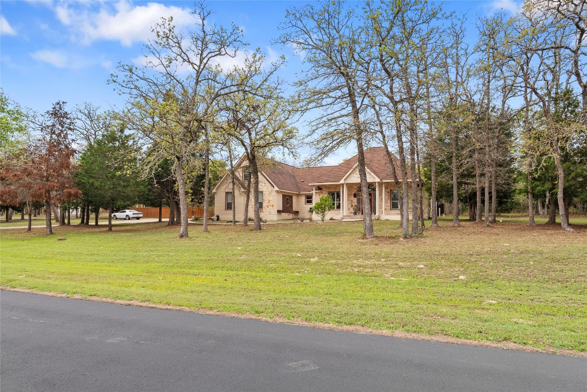 330 Arbors Circle Elgin, TX 78621 - Photo 3 of 39 View of front of property featuring a front yard