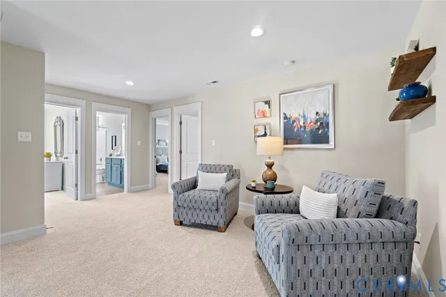 a living room with furniture and a couch